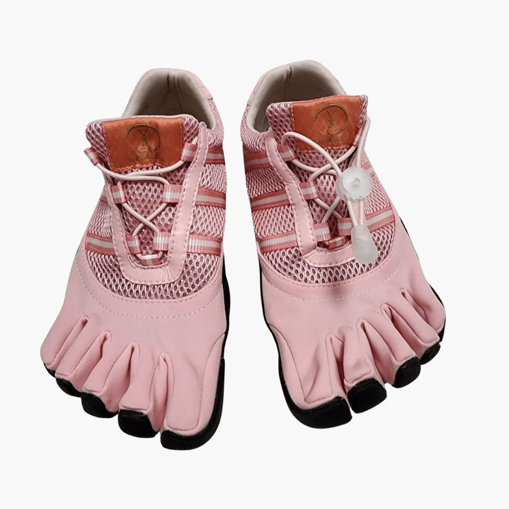 Pink barefoot grip shoes designed for yoga, Pilates, and at-home stretching.
